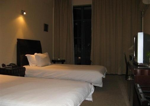 Baolong Homelike Hotel - Wusong Branch Şanghay Oda fotoğraf